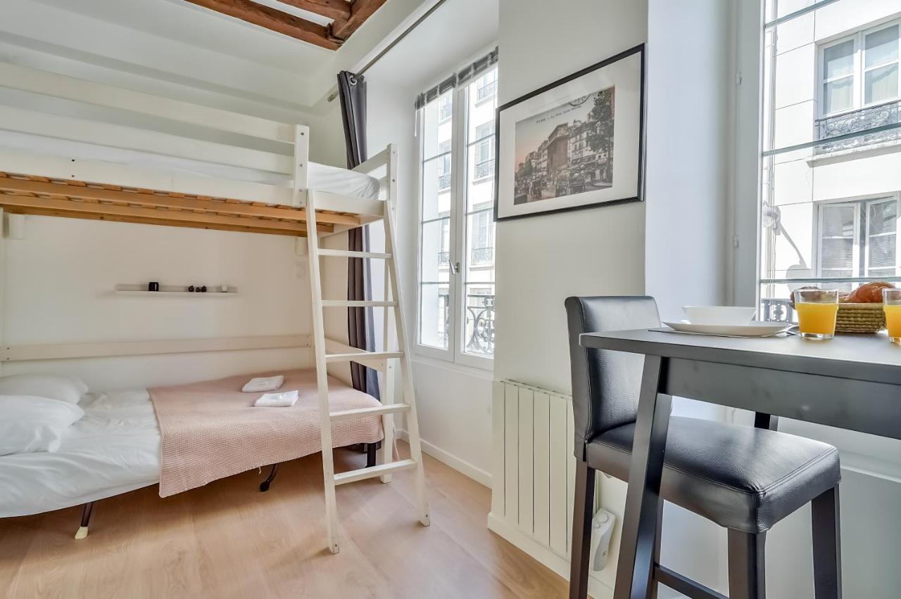 Apartamento Cute Mezzanine Studio In The Heart Of París Exterior foto